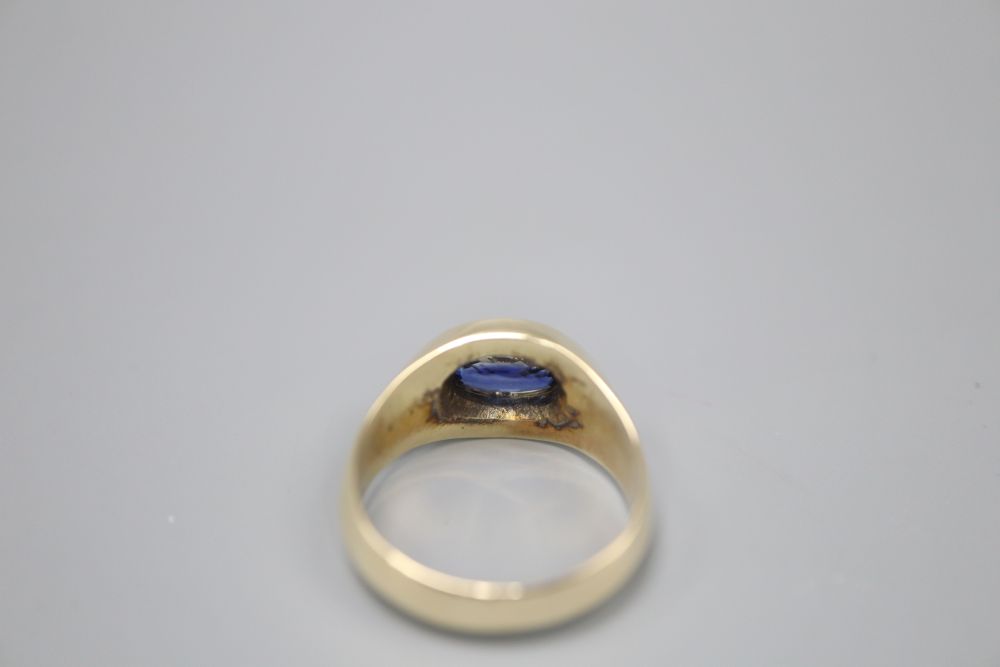 A 14ct gold and sapphire dress ring, size Q, gross 7.8 grams